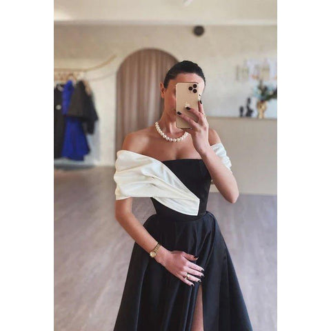 Vestido clásico y atemporal de fiesta de noche con hombros descubiertos y mangas casquillo en forma de A