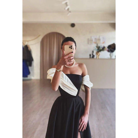 Vestido clásico y atemporal de fiesta de noche con hombros descubiertos y mangas casquillo en forma de A