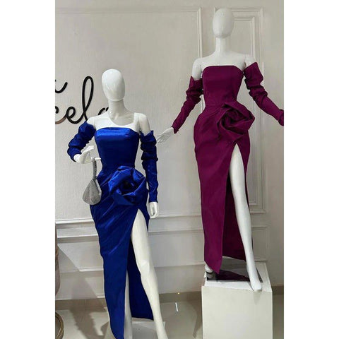 Vestido de fiesta clásico y atemporal con hombros descubiertos, mangas largas y abertura lateral