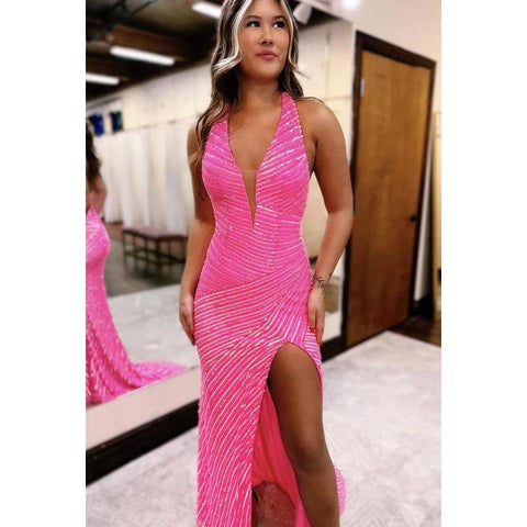 Vestido de fiesta de noche con cuello halter, sin mangas, con abertura lateral y lentejuelas, espalda descubierta y adornado.