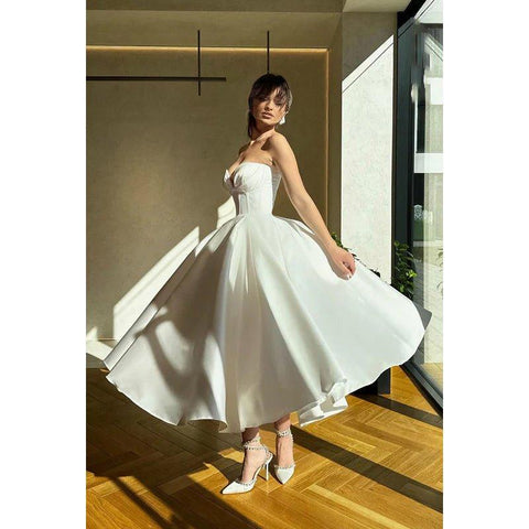 Robe de bal élégante et formelle, col en V, coupe trapèze, sans manches, sans bretelles