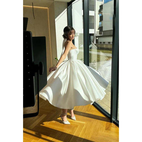 Robe de bal élégante et formelle, col en V, coupe trapèze, sans manches, sans bretelles