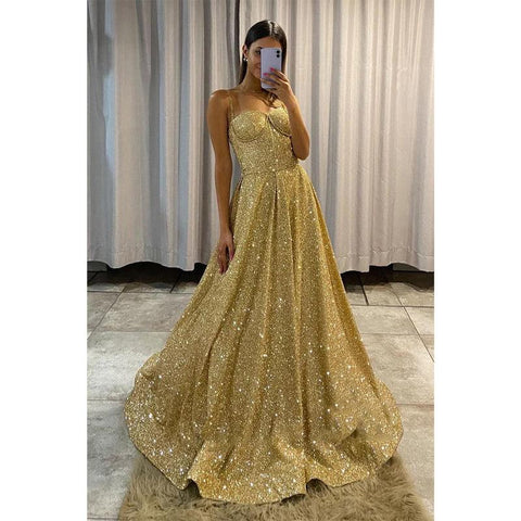 Vestido de fiesta dorado con tirantes finos y purpurina 