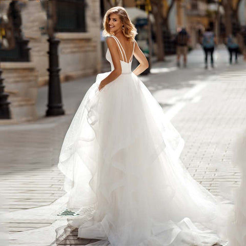 Robe de mariée sexy en organza, dos nu, coupe trapèze, décolleté en V, sans manches, bretelles spaghetti simples, pour la mariée 