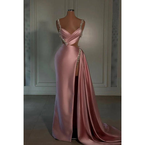 Elegante y lujoso vestido de fiesta de noche con escote en V, sin mangas y abertura.