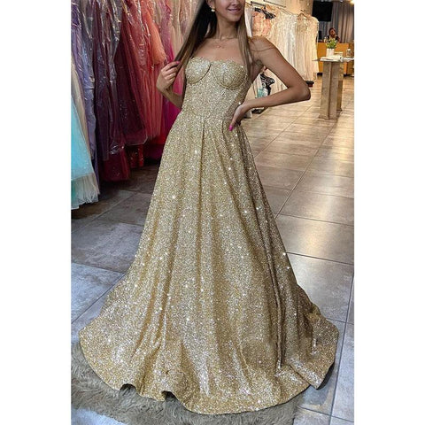 Vestido de fiesta dorado con tirantes finos y purpurina 