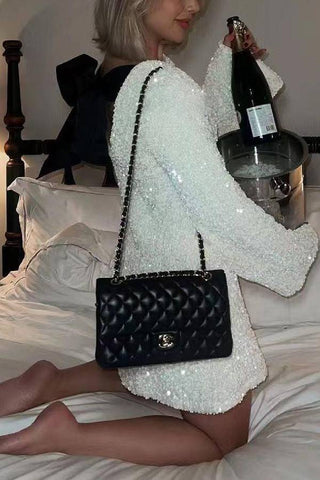 Vestido corto suelto con lentejuelas y lazo en la espalda para bailar toda la noche 