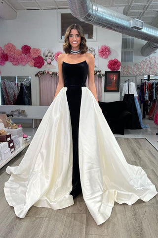 Robe de bal longue Club Chic trapèze bustier noire et blanche avec traîne