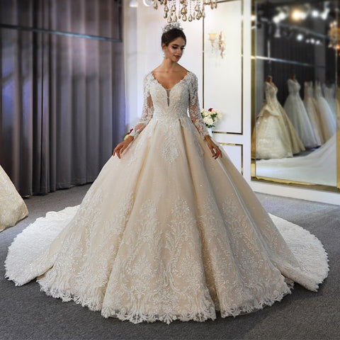 Long A-Line Sweetheart Backless Appliques Lace Sequins Wedding Dress with Sleeves