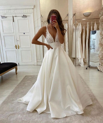 Long A-Line V-neck Spaghetti Straps Backless Wedding Dress With Pockets