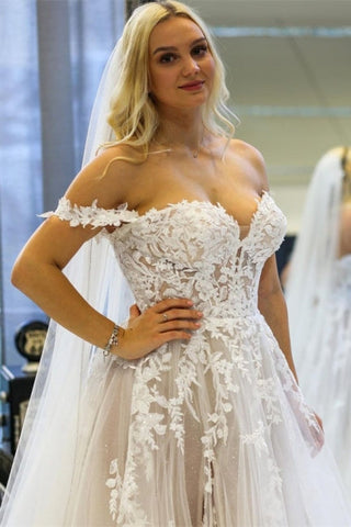 Vestidos de novia modernos de corte A, sin mangas y con hombros descubiertos, con encaje.