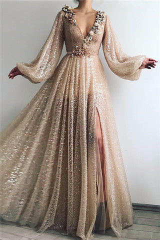 Robe de bal sobre longue, trapèze, col en V, sequins et fente.