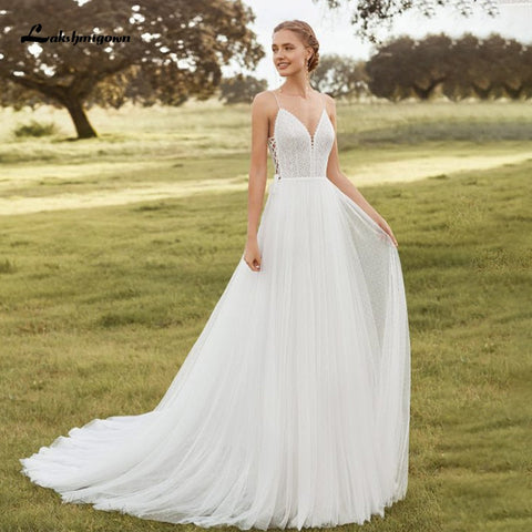 Vestido de novia bohemio Baoleely Lakshmigown con tirantes finos, escote en V, espalda descubierta, encaje bohemio, vestido de novia de tul para la playa, colección 2021.