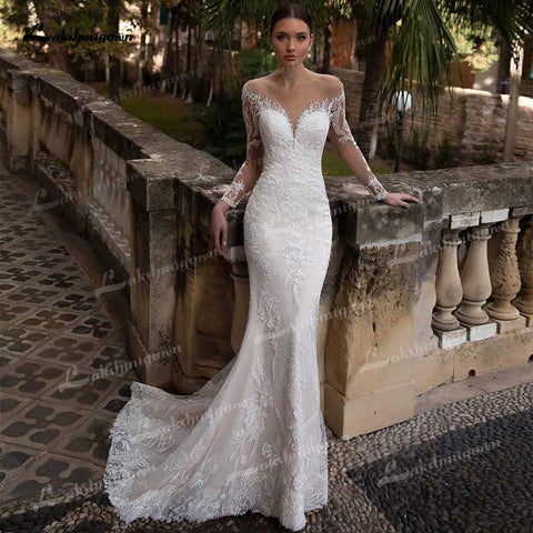 Baoleely Superbes robes de mariée trapèze en dentelle illusion, col bateau, manches longues, traîne courte, tulle, plis, appliques, perles