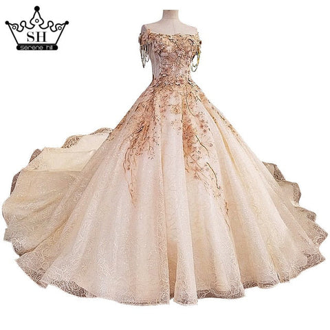 Robe de mariée sexy sans manches, luxueuse et élégante, avec des fleurs et des perles