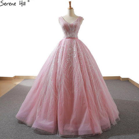 Vestidos de novia sin mangas con escote en V y bordado de perlas