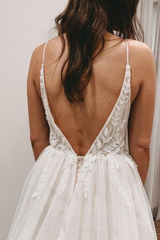 Vestidos de novia de encaje sin mangas con tirantes finos y corte en A