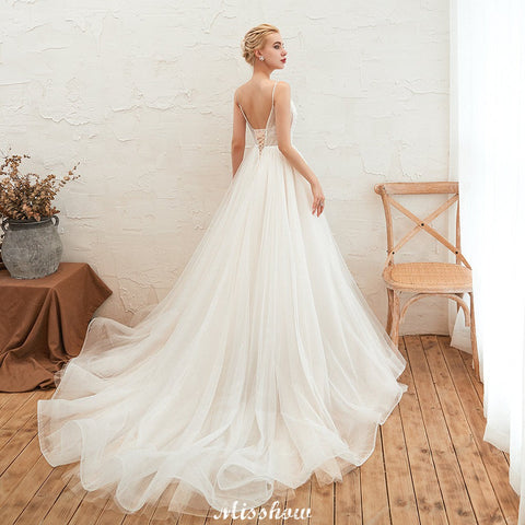 Spaghetti Straps Plunging V-Neck Wedding Dress Low Back Champagne Bridal Gown