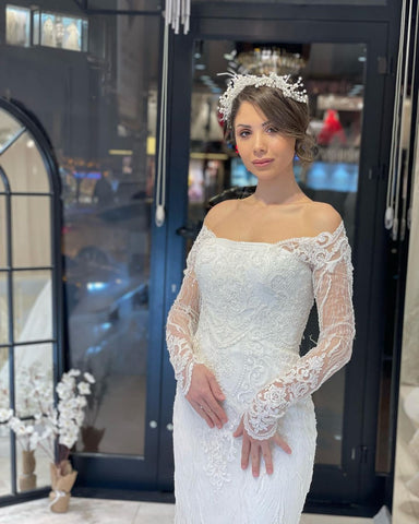 Robe de mariée sirène tendance en dentelle, longue jusqu'au sol et manches longues, à manches longues.