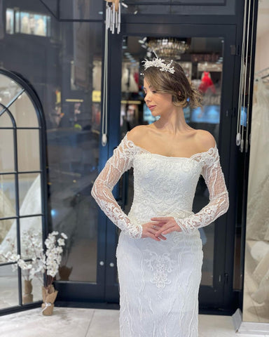 Robe de mariée sirène tendance en dentelle, longue jusqu'au sol et manches longues, à manches longues.